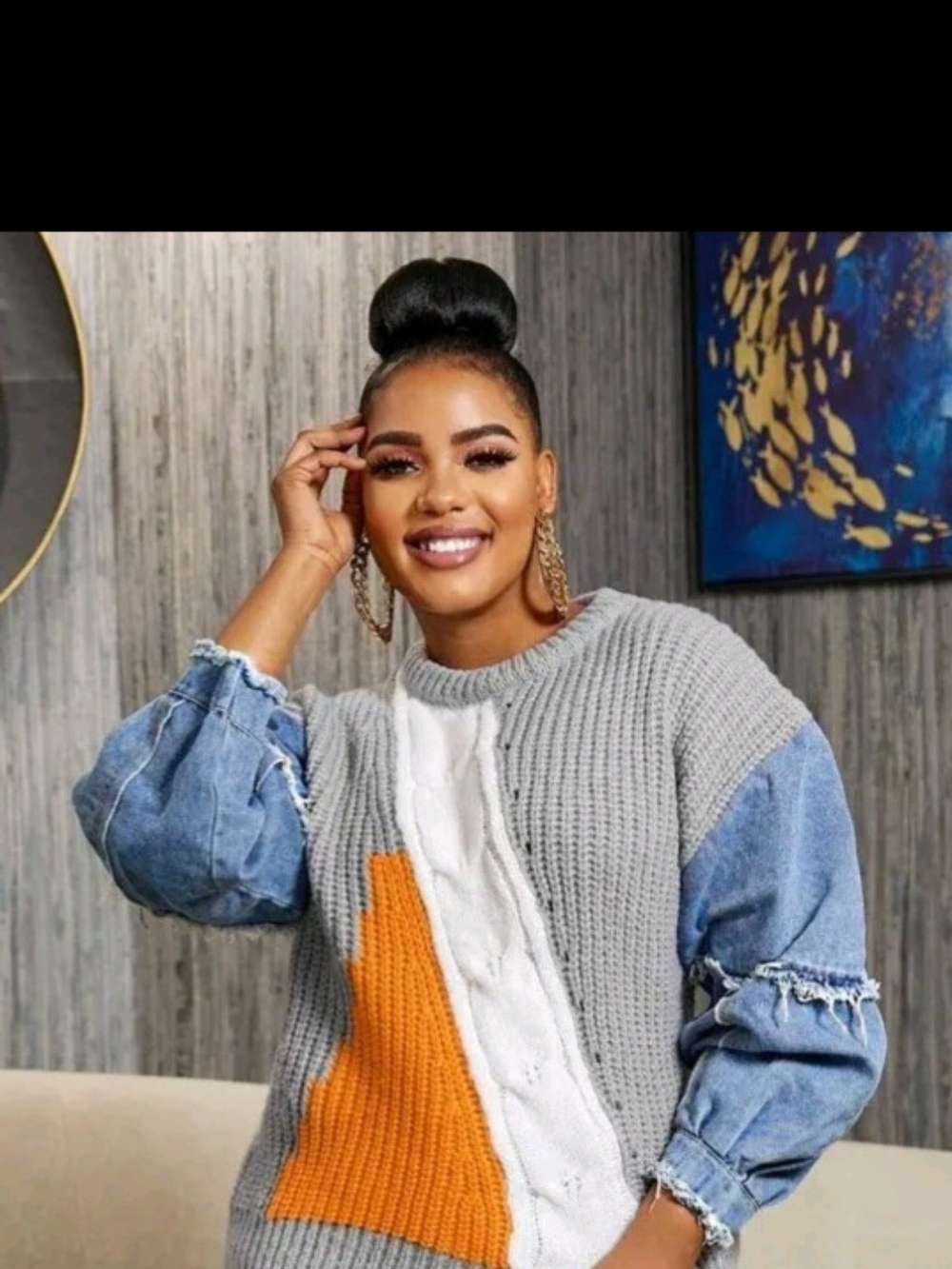 Grey Knit Sweater with Denim Sleeves and Orange Accent